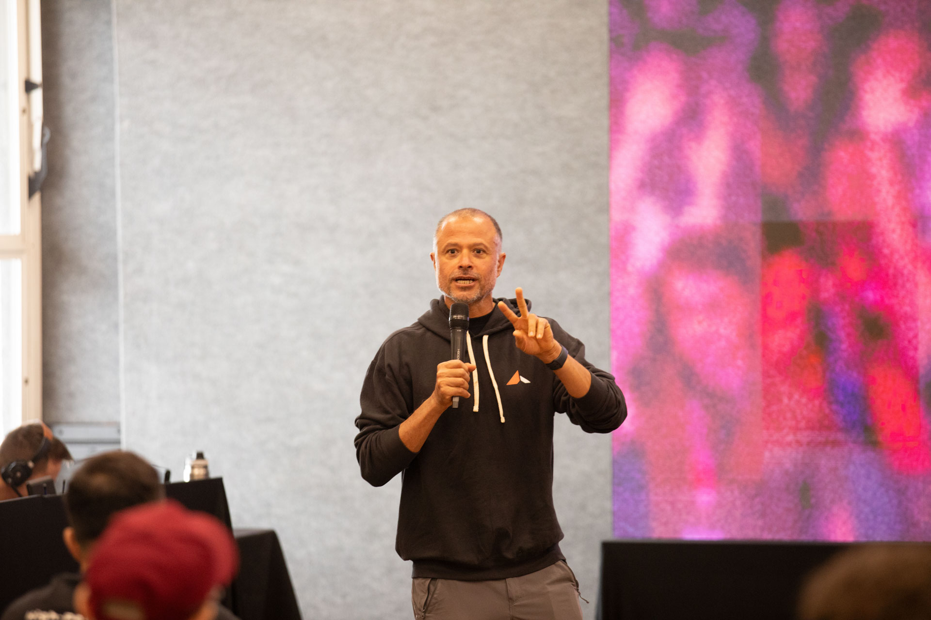 GopherCon LATAM 2026 — MJ making a point during his opening remarks.