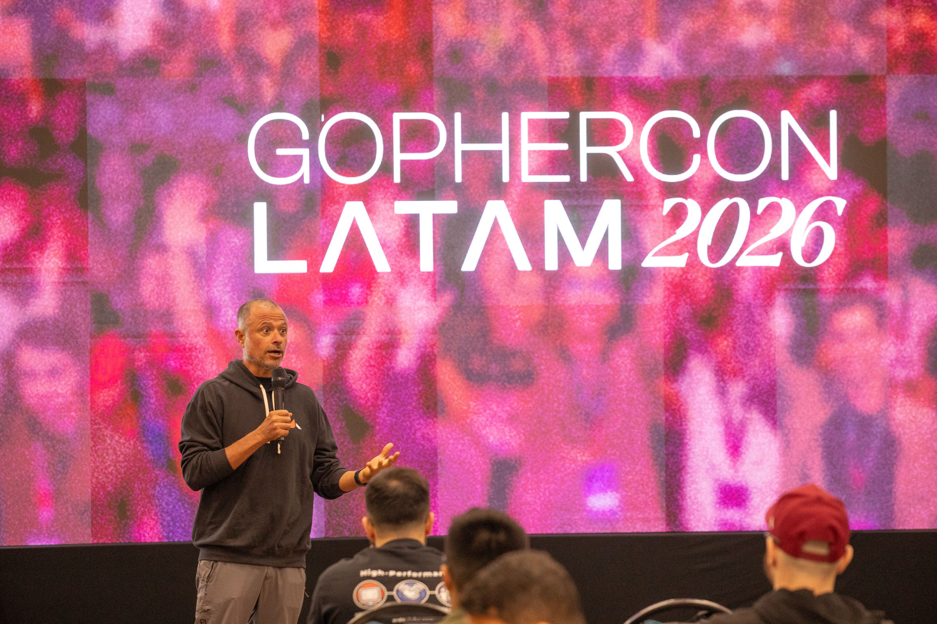 GopherCon LATAM 2026 — MJ setting up the day's agenda for Go developers.