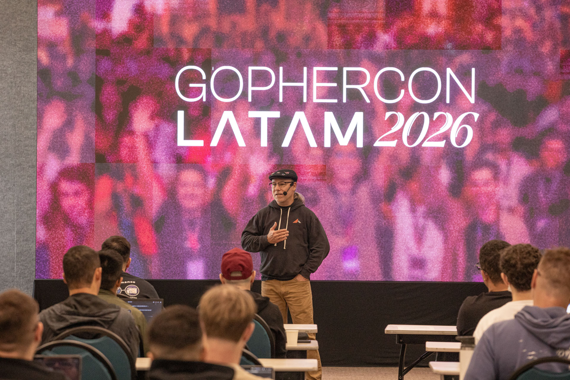 GopherCon LATAM 2026 — Bill Kennedy speaking to a classroom under the conference branding.