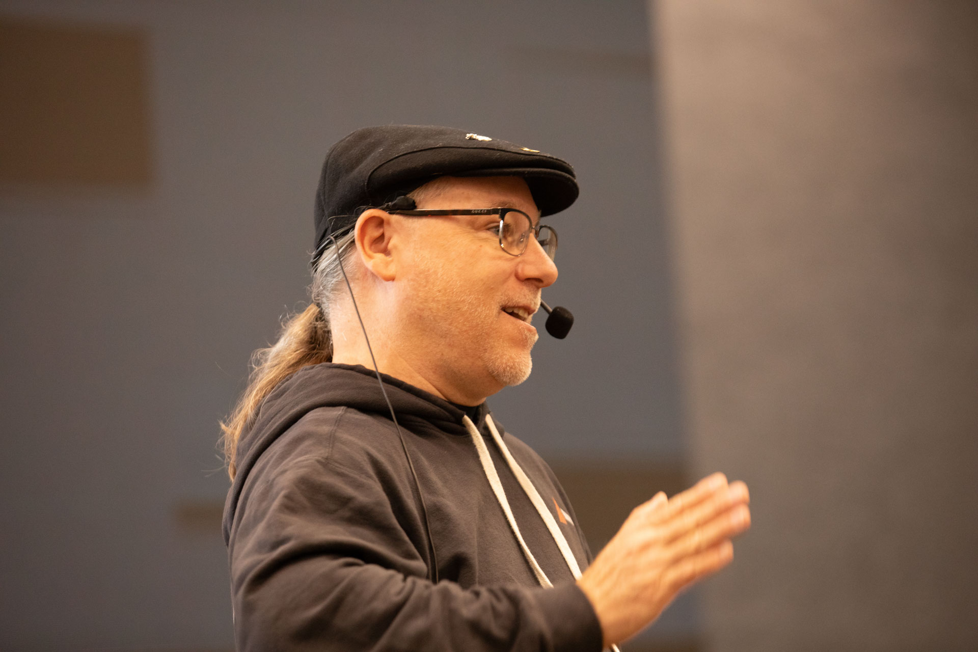 GopherCon LATAM 2026 — Bill Kennedy talking through an idea with his headset microphone.
