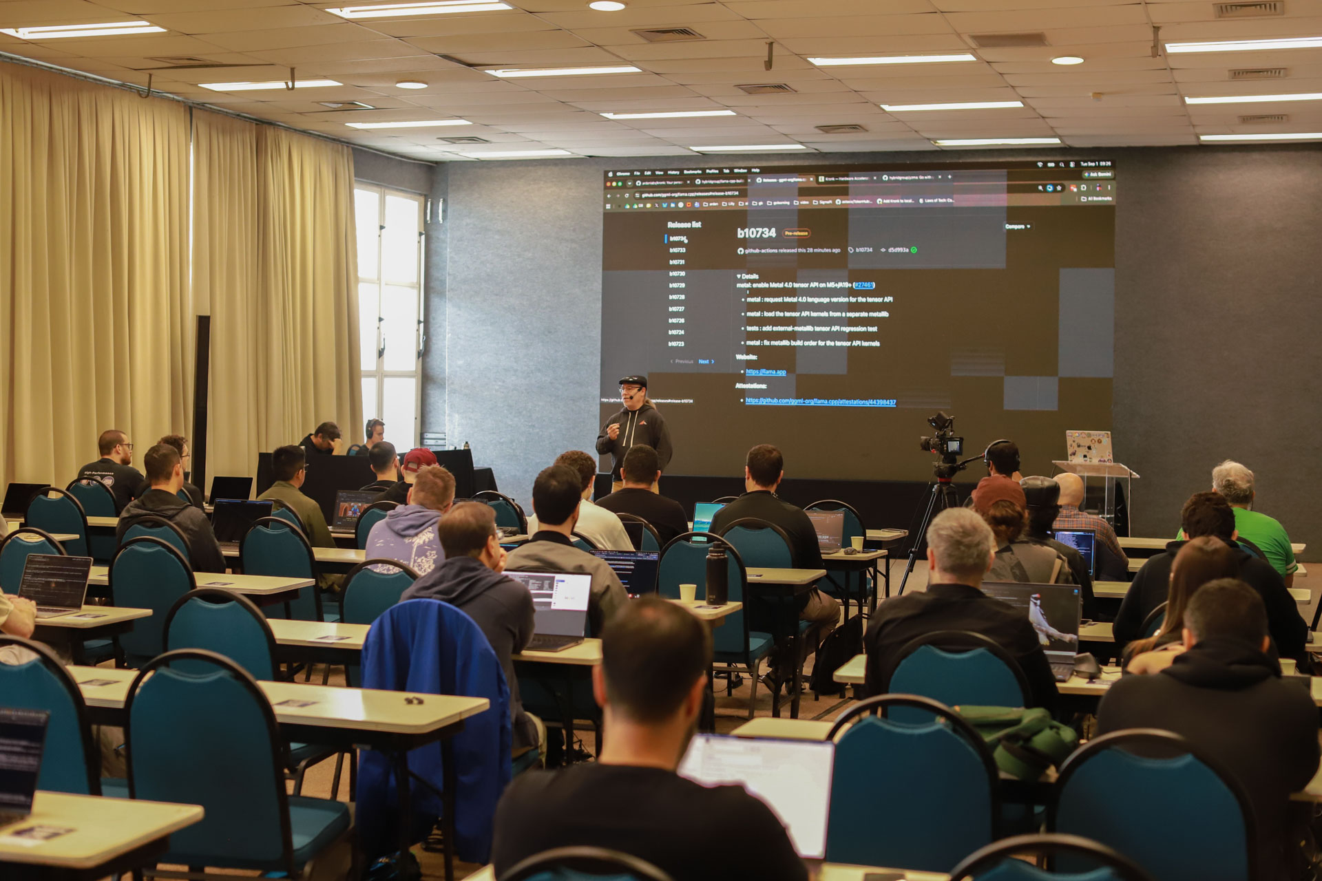 GopherCon LATAM 2026 — Bill Kennedy walking the workshop through upstream release notes.