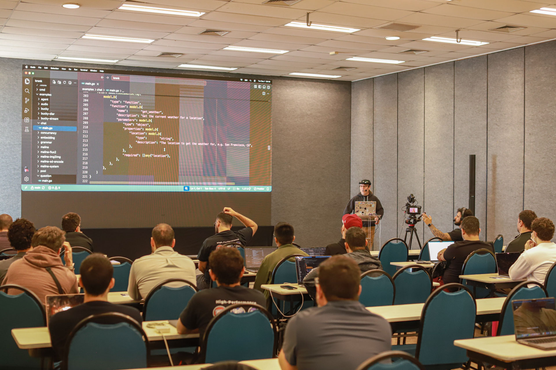GopherCon LATAM 2026 — Bill Kennedy showing Go tool-calling code to the workshop.