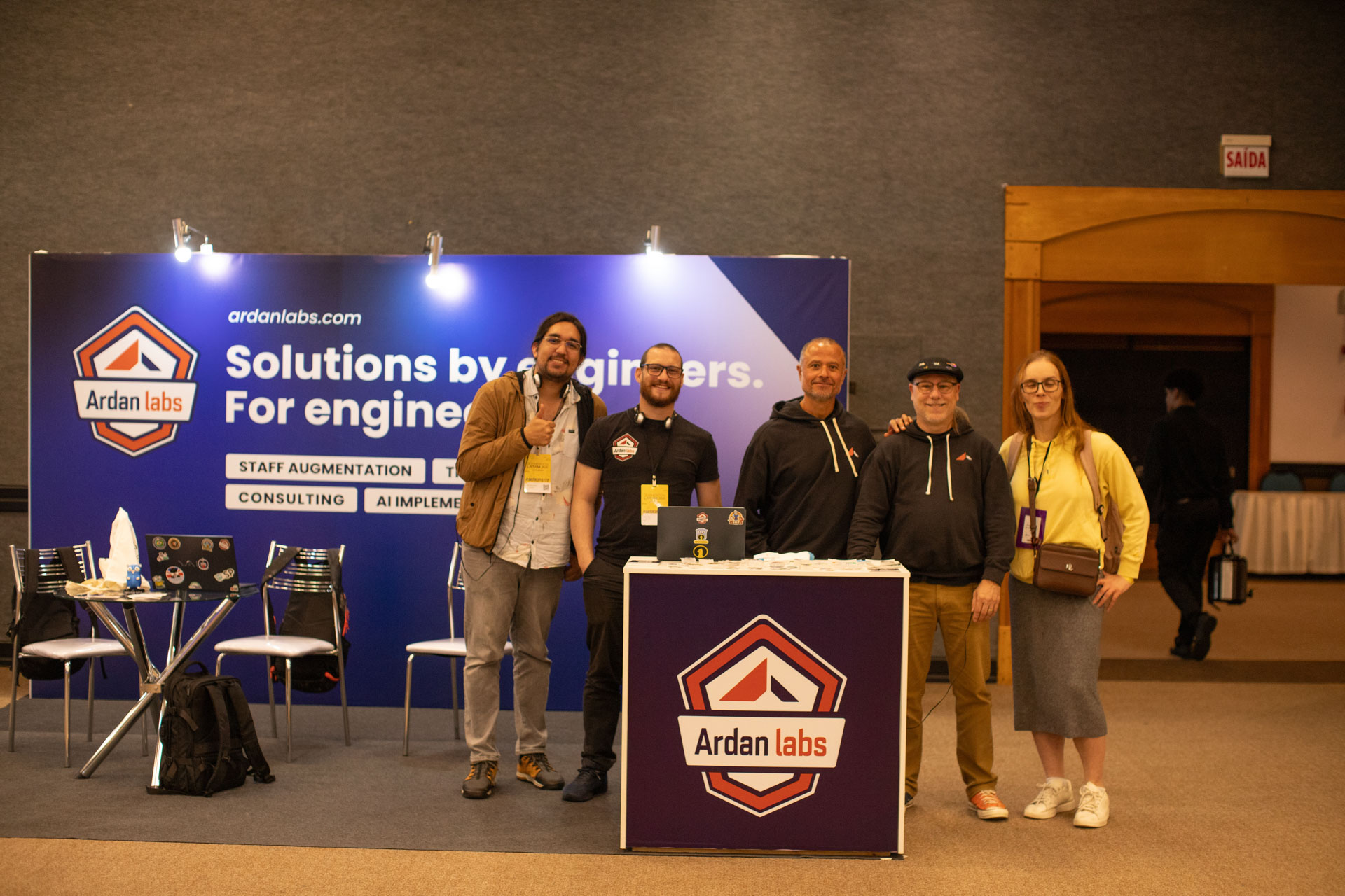 GopherCon LATAM 2026 — the Ardan Labs team gathered at their sponsor booth.