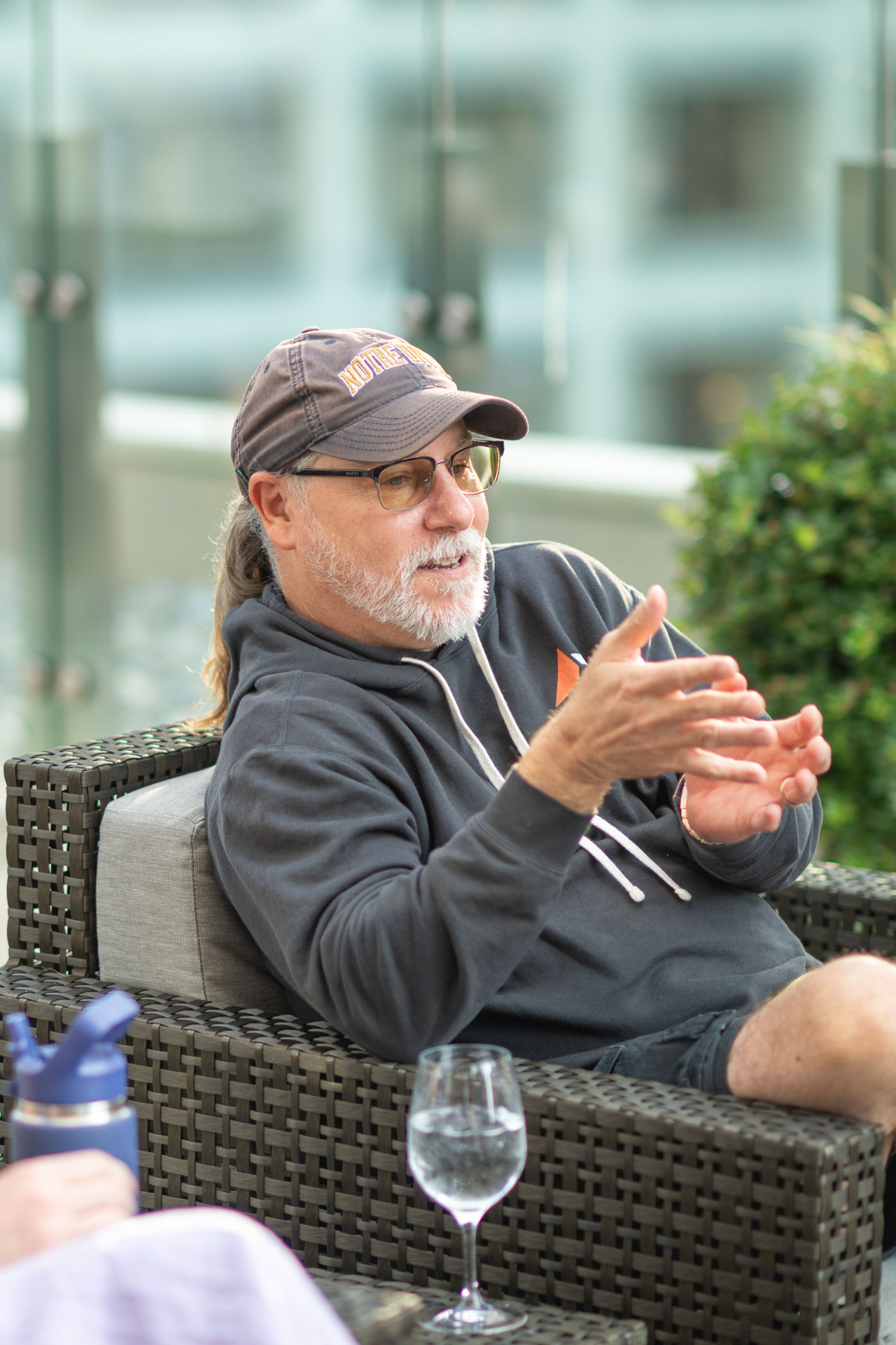 GopherCon US 2026 — Bill Kennedy explaining an idea during the rooftop meetup.