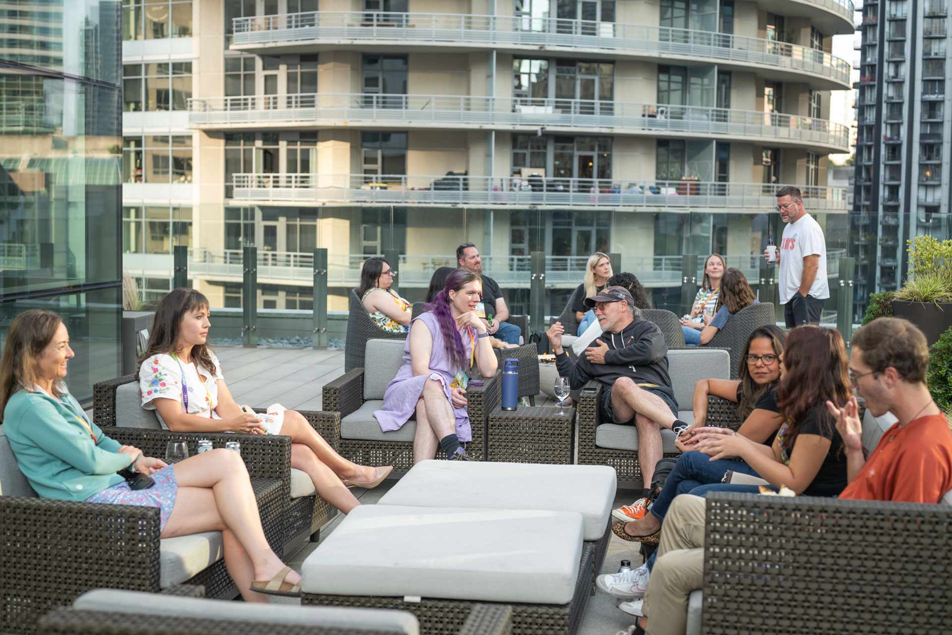 GopherCon US 2026 — a circle of attendees talking at the Ardan Labs rooftop gathering.