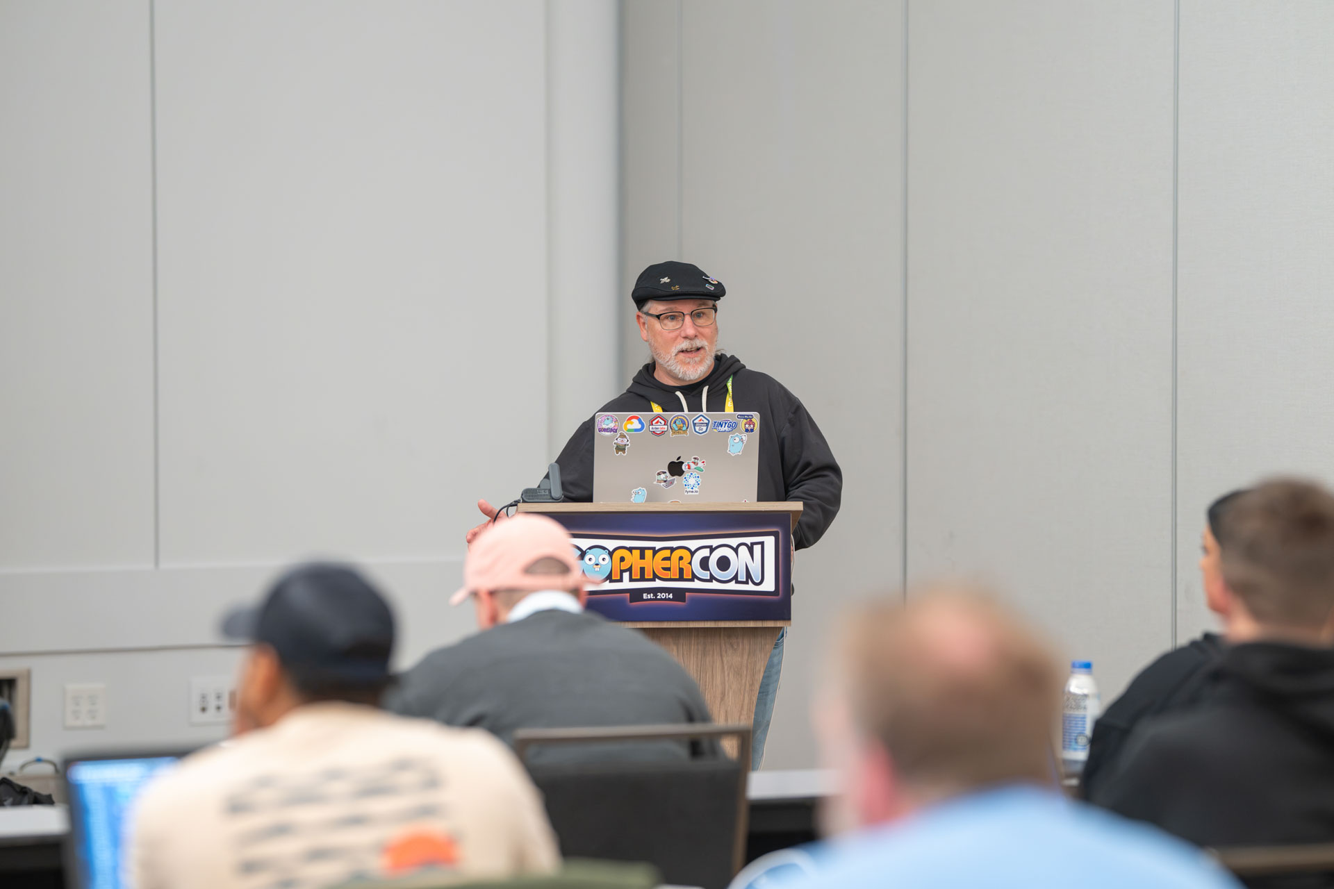 GopherCon US 2026 — Bill Kennedy presenting from the GopherCon podium during the AI workshop.