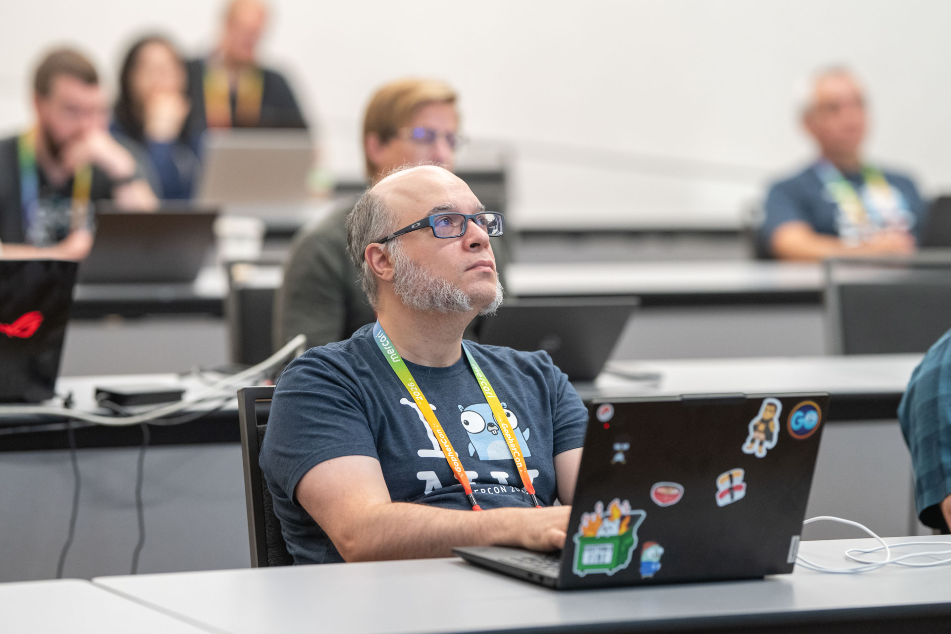 GopherCon US 2026 — a Gopher listening closely during the Ultimate Practical AI workshop.