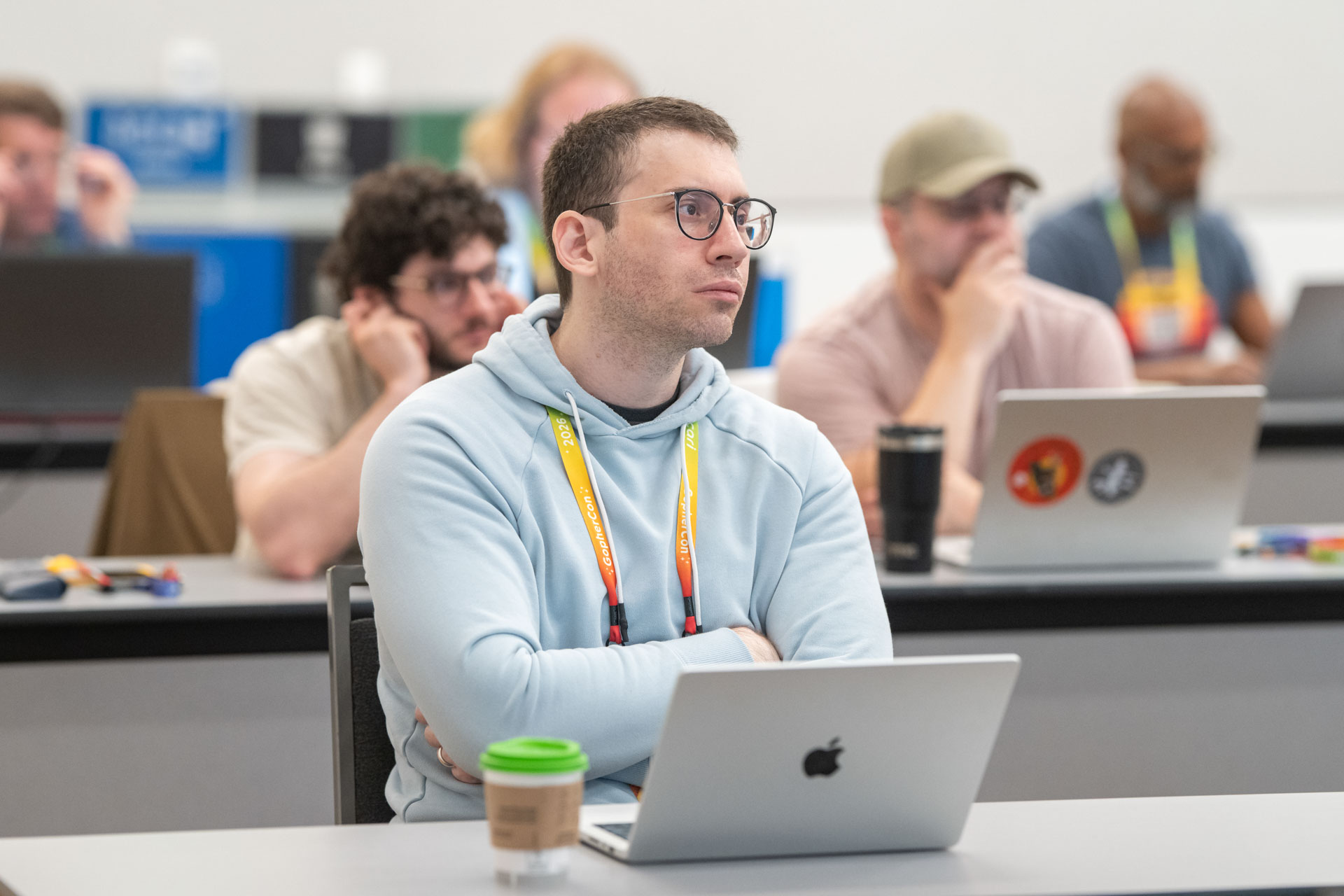GopherCon US 2026 — attendees watching the screen during an AI workshop session.