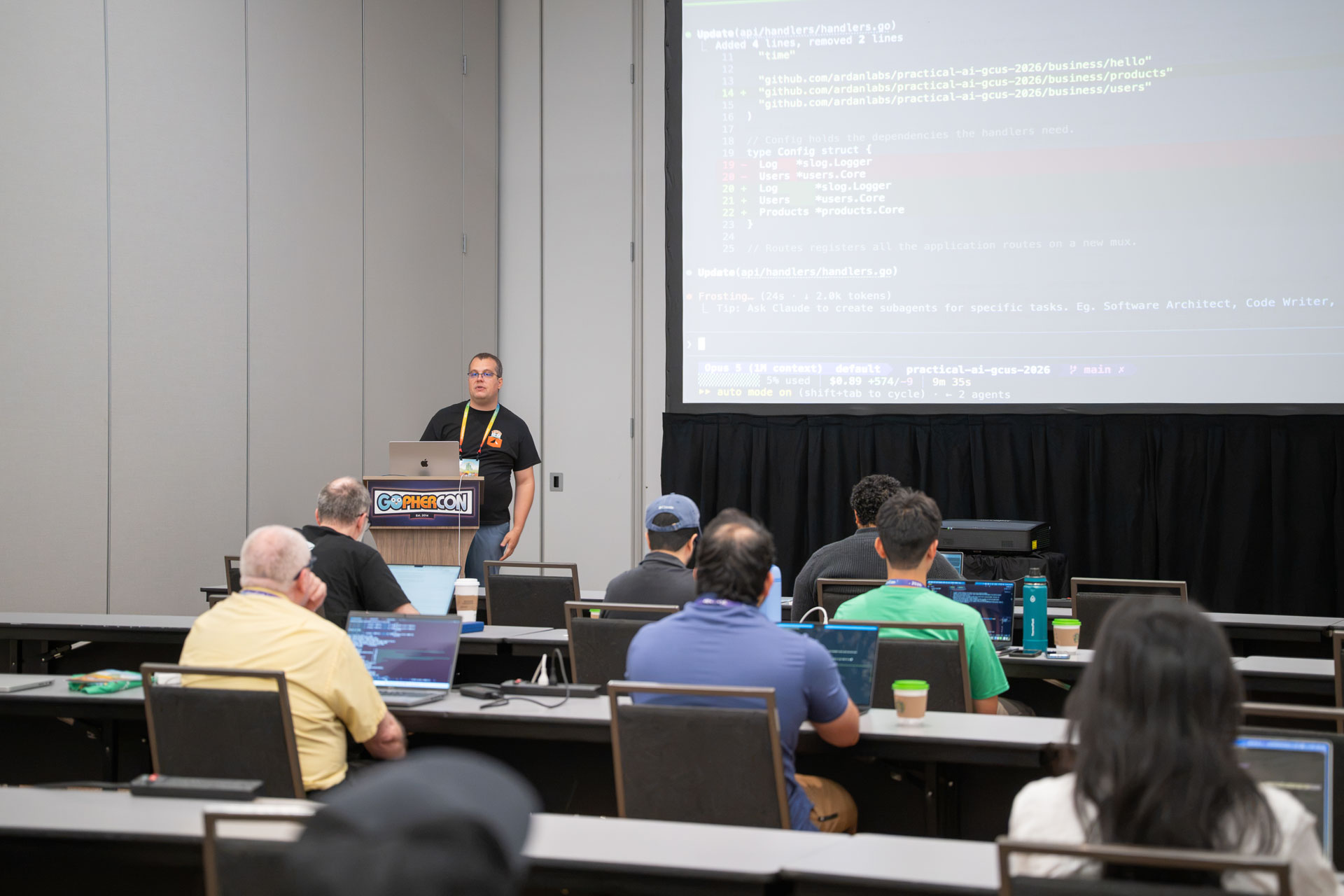 GopherCon US 2026 — Go code on the big screen during the Ultimate Practical AI workshop.