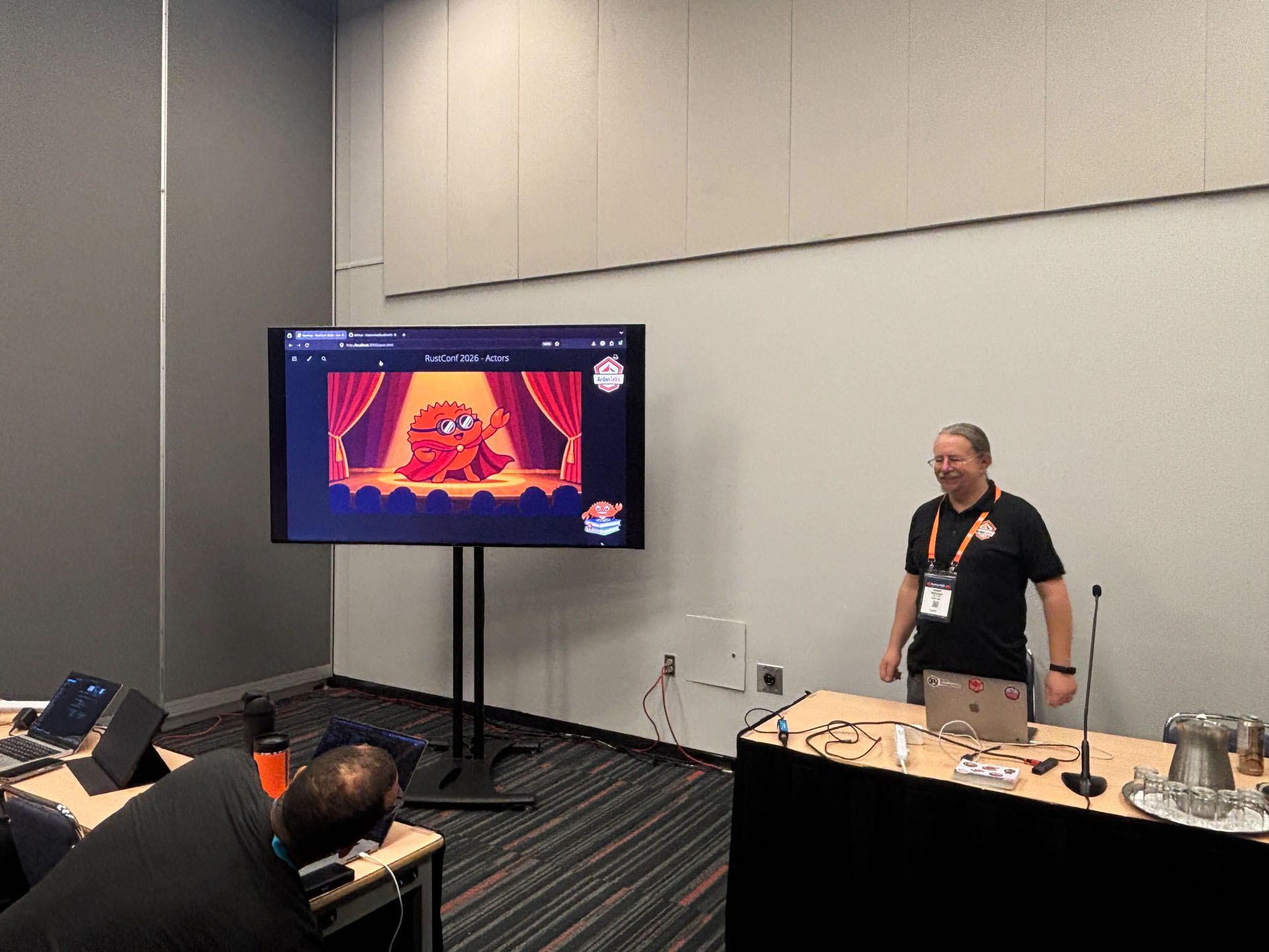 RustConf 2026 — Herbert Wolverson setting up beside the workshop title slide.