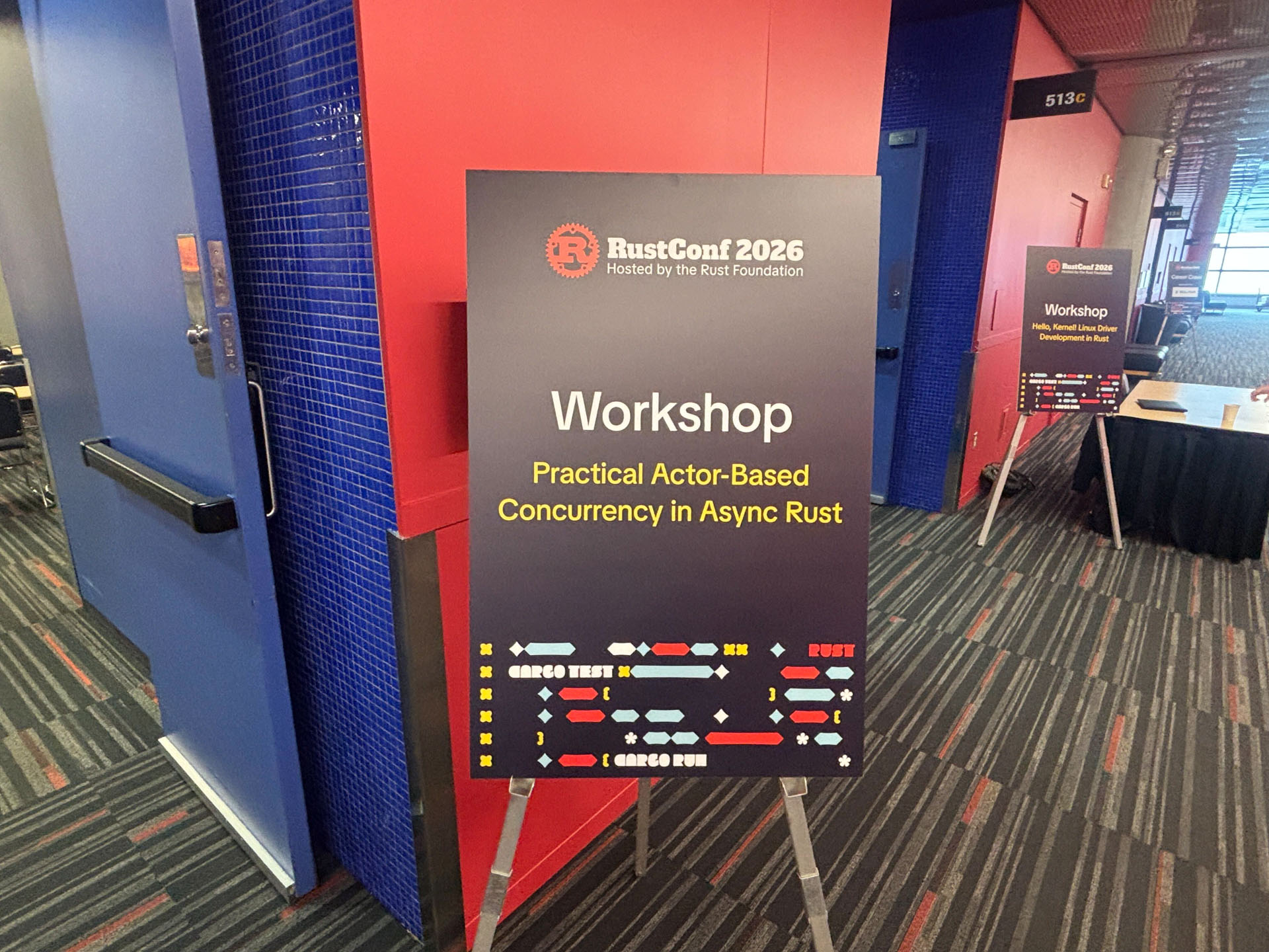 RustConf 2026 — the room sign for the Practical Actor-Based Concurrency in Async Rust workshop.
