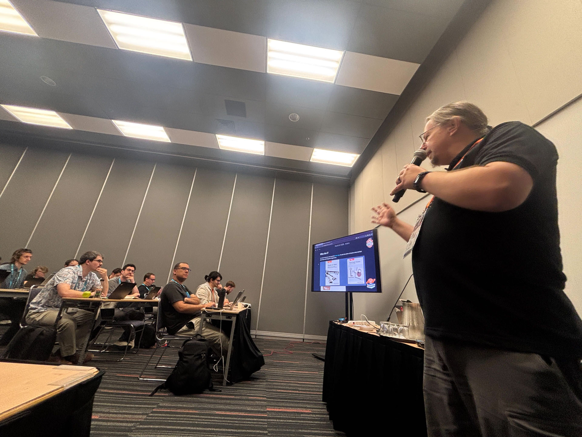 RustConf 2026 — Herbert Wolverson working through a concurrency diagram with the workshop.