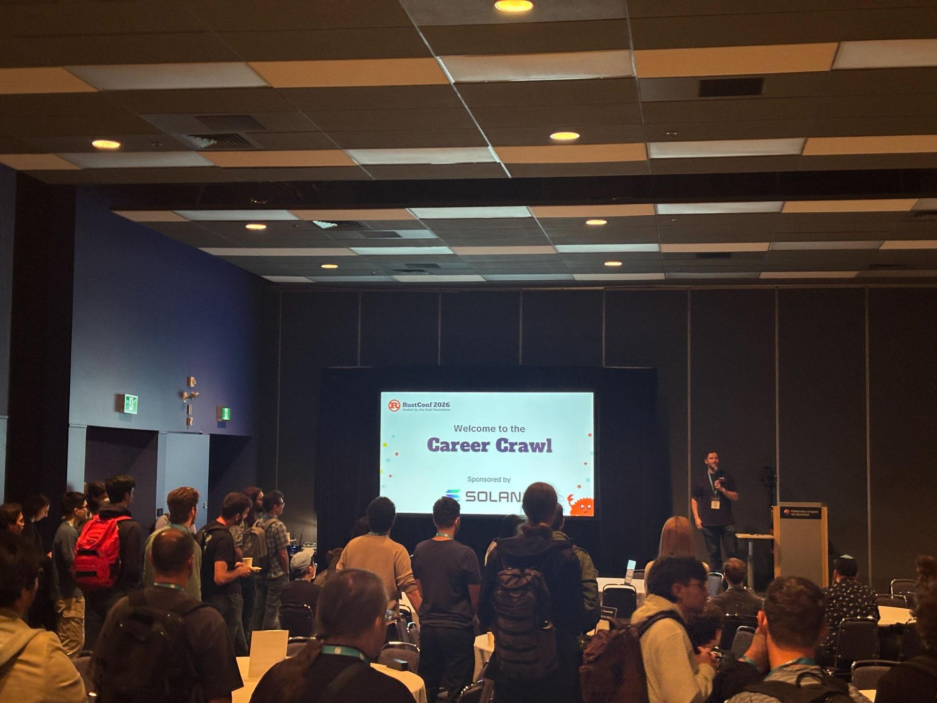 RustConf 2026 — an organizer welcoming attendees to the Career Crawl.
