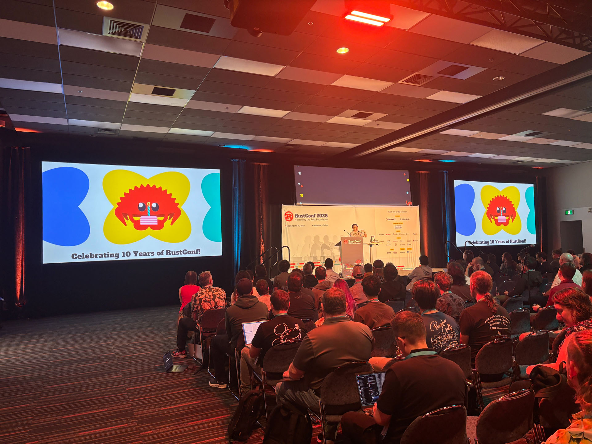 RustConf 2026 — the Celebrating 10 Years of RustConf slide on the main stage.
