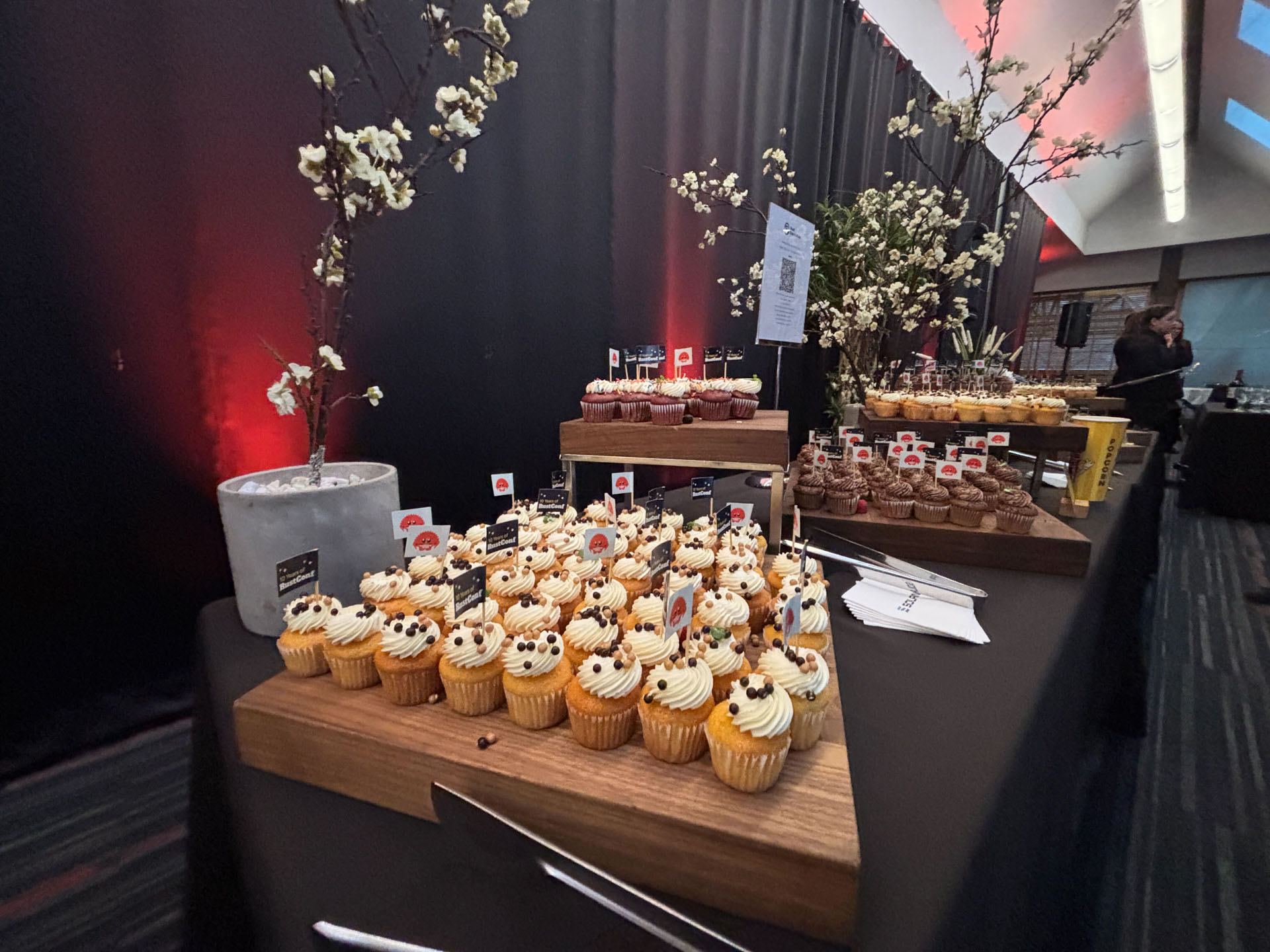 RustConf 2026 — dessert tables of RustConf-branded cupcakes at the reception.