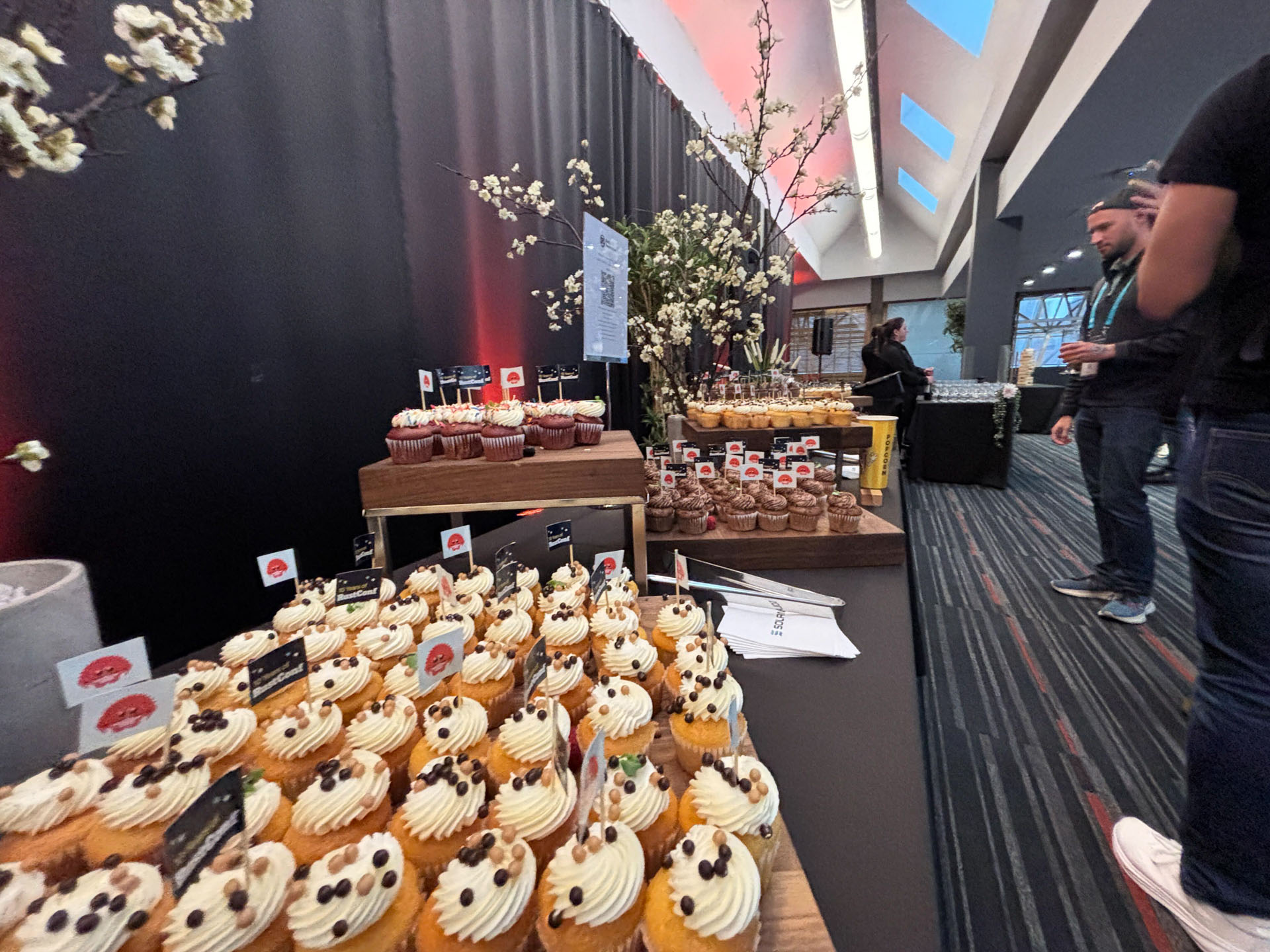 RustConf 2026 — the reception dessert spread with Rust cupcake toppers.