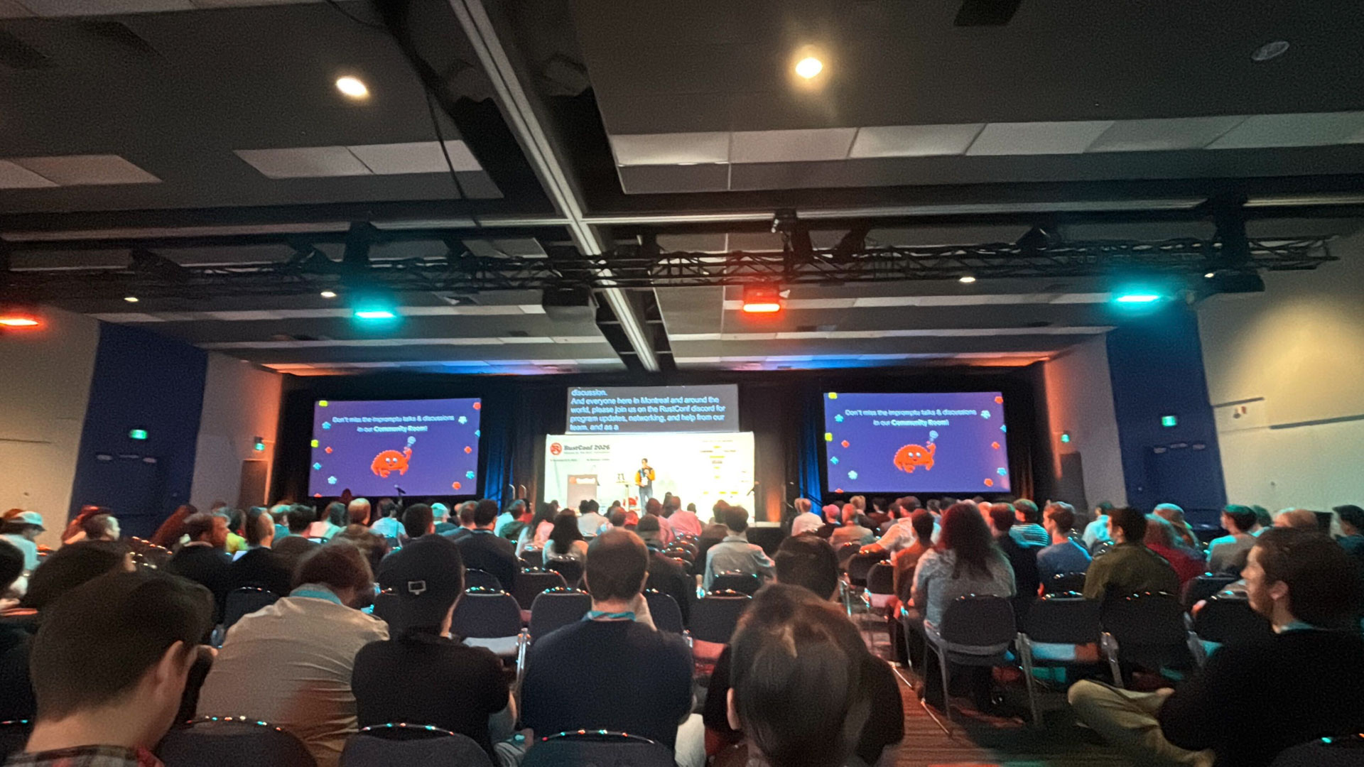 RustConf 2026 — live captions running on the main stage screens during a keynote.