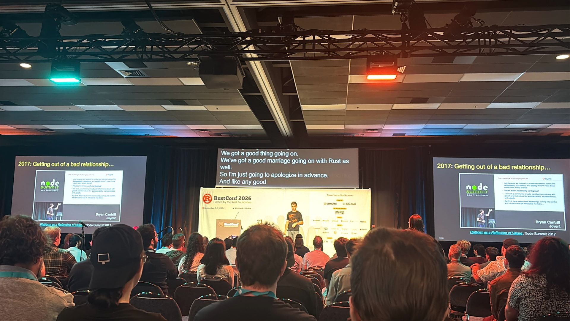 RustConf 2026 — a keynote slide revisiting Rust's early adoption story.