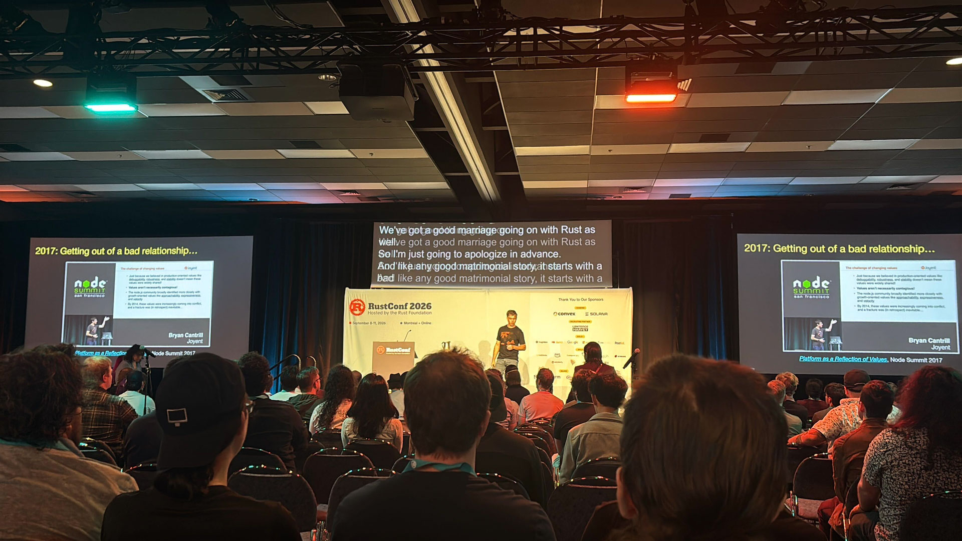 RustConf 2026 — a main stage keynote on the long relationship between teams and Rust.