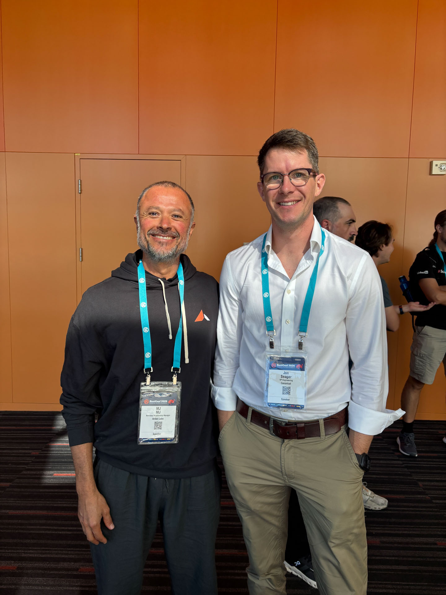 RustConf 2026 — MJ with a conference attendee between sessions.