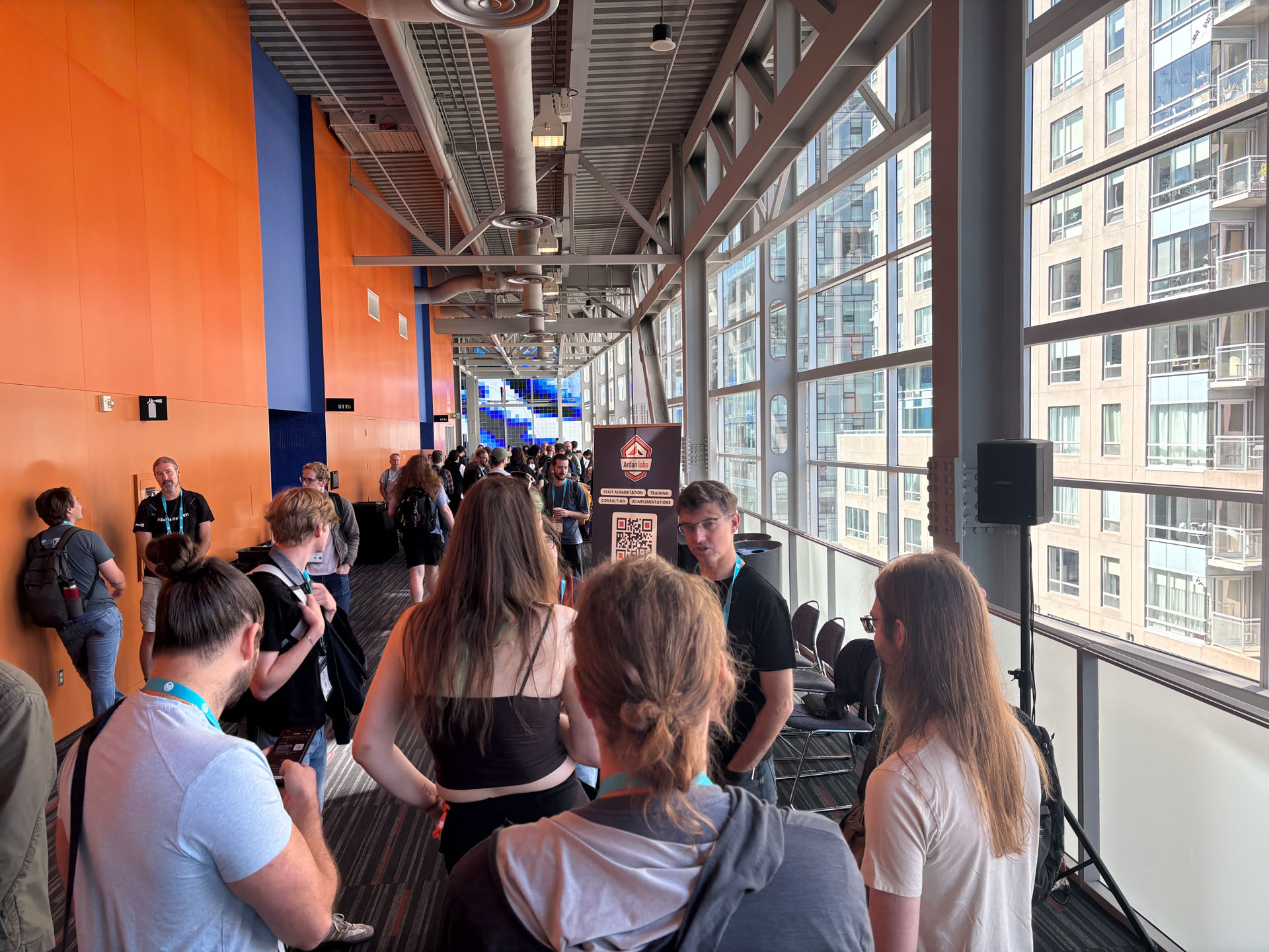 RustConf 2026 — the hallway track filling up beside the Ardan Labs booth.