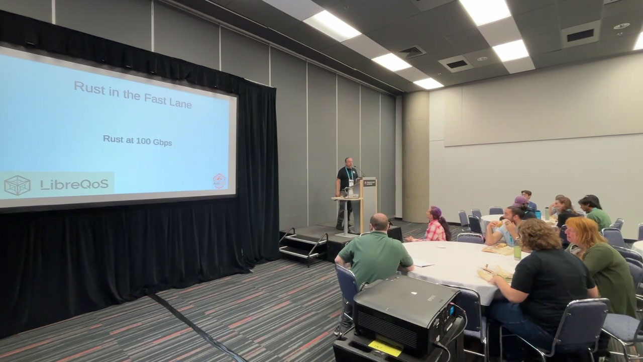 RustConf 2026 — Herbert Wolverson presenting LibreQoS performance work written in Rust.