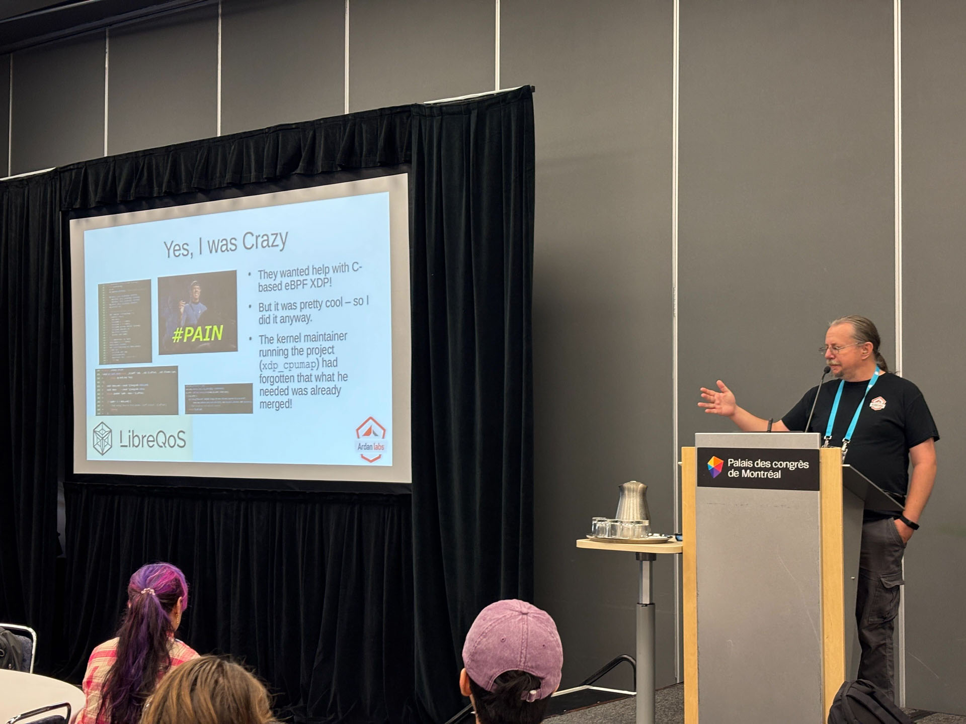 RustConf 2026 — Herbert Wolverson at the Palais des congrès podium during his talk.