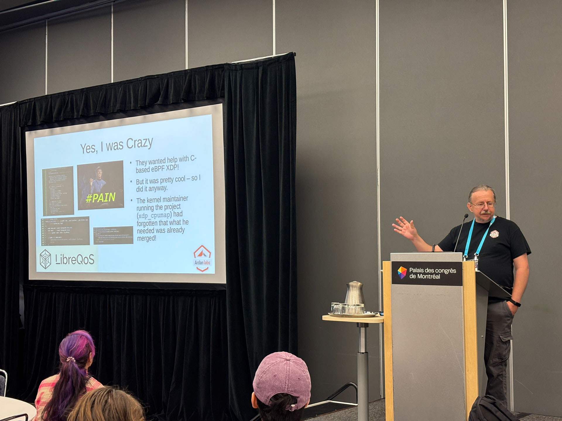 RustConf 2026 — Herbert Wolverson gesturing to a slide about C-based eBPF and XDP.