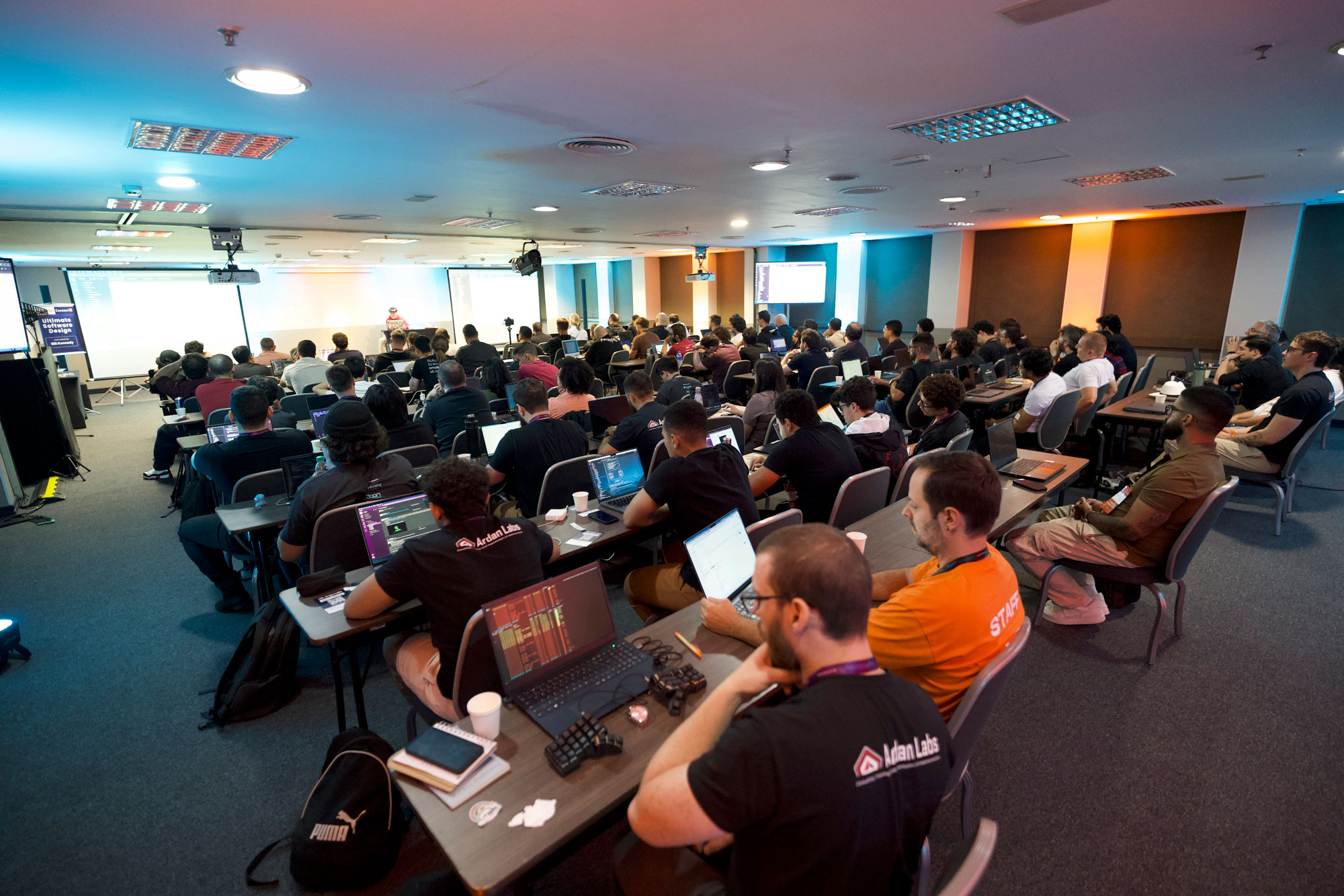 Large training room filled with attendees at laptops during an Ultimate Software Design class